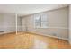 Inviting living area with bright walls, hardwood floors, and a neutral color palette for versatile styling at 4954 Browns Mill Rd, Lithonia, GA 30038