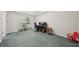 Versatile bedroom space with a large window, providing natural light for a comfortable work or relaxation area at 600 Cowan Rd, Covington, GA 30016