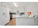 Spacious kitchen offering ample counter space, appliances, and white cabinets, perfect for culinary enthusiasts at 600 Cowan Rd, Covington, GA 30016