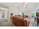 Spacious living room features vaulted ceiling, fireplace, and comfortable seating arrangement at 600 Cowan Rd, Covington, GA 30016