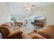 Bright living room with vaulted ceiling, fireplace, and comfortable seating; perfect for relaxation and entertainment at 600 Cowan Rd, Covington, GA 30016