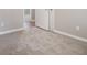 Neutral bedroom featuring plush gray carpeting, creating a cozy and inviting space at 100 Spicewood Ct, South Fulton, GA 30349