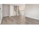 Bright and airy living room with wood floors and staircase at 100 Spicewood Ct, South Fulton, GA 30349
