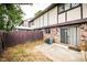 Enclosed brick patio with sliding glass door and privacy fence is ideal for outdoor enjoyment at 1200 Ashborough Se Ter # A, Marietta, GA 30067