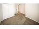 Bedroom with view of the doorway and closet, featuring carpet floors at 1200 Ashborough Se Ter # A, Marietta, GA 30067