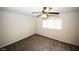 Neutral bedroom with ceiling fan and window providing natural light at 1200 Ashborough Se Ter # A, Marietta, GA 30067