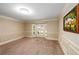 Spacious dining room with a bay window letting in natural light, neutral colors, and detailed trim at 1565 Kings Xing, Smoke Rise, GA 30087