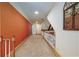 Upstairs hallway featuring carpeted floor, neutral colors, and access to several rooms at 1565 Kings Xing, Smoke Rise, GA 30087