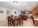 Open kitchen with stainless steel appliances and a dining area at 1565 Kings Xing, Smoke Rise, GA 30087