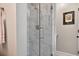 Bathroom featuring a modern glass enclosed tile shower at 505 Armor Knl, Powder Springs, GA 30127