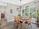 Breakfast area featuring a view of the landscaped outdoors with a decorative light fixture at 505 Armor Knl, Powder Springs, GA 30127
