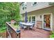 Relaxing deck with outdoor dining area, grill and access to the backyard at 505 Armor Knl, Powder Springs, GA 30127
