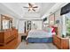 A spacious main bedroom with hardwood floors and views into the home office at 505 Armor Knl, Powder Springs, GA 30127