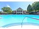 Resort-style pool and clubhouse showcasing a luxurious community gathering space and swimming facilities at 5347 Harbury Cv, Suwanee, GA 30024