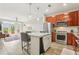 Bright kitchen features stainless steel appliances, granite counters, and an island with bar seating at 840 United Se Ave # 205, Atlanta, GA 30312