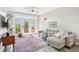 Cozy living room with lots of natural light and french doors leading to a small patio at 840 United Se Ave # 205, Atlanta, GA 30312