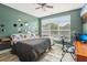Relaxing bedroom with large window for natural light and wood-look floors at 840 United Se Ave # 205, Atlanta, GA 30312