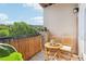Private outdoor patio with seating, landscaping, and beautiful view at 840 United Se Ave # 205, Atlanta, GA 30312