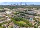 Aerial view showcasing a well-maintained neighborhood with a community park and pond at 183 Cleveland # B, Atlanta, GA 30316