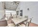 Large outdoor living space includes metal roof, dining area, and overhead string lights perfect for entertaining at 183 Cleveland # B, Atlanta, GA 30316