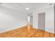 A modern bedroom with beautiful hard wood floors, and white ceiling fan at 183 Cleveland # B, Atlanta, GA 30316