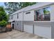 Rear exterior of home with attached two car garage and upper level patio area at 183 Cleveland # B, Atlanta, GA 30316