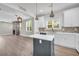 The Kitchen features white cabinets, stainless steel appliances, and gray kitchen island at 183 Cleveland # B, Atlanta, GA 30316