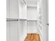 Well-organized walk-in closet with custom shelving and hardwood floors at 183 Cleveland # B, Atlanta, GA 30316