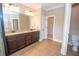 Primary bathroom features granite countertops, double sinks, and tile floors at 2567 Willow Field Se Xing # 22, Marietta, GA 30067