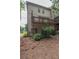 Exterior view of deck with a landscaped yard at 2567 Willow Field Se Xing # 22, Marietta, GA 30067