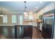 Well-equipped kitchen with stainless steel appliances, granite countertops, and a center island at 2567 Willow Field Se Xing # 22, Marietta, GA 30067