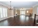 Expansive living room featuring hardwood floors, crown molding, fireplace, and natural light at 2567 Willow Field Se Xing # 22, Marietta, GA 30067