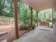 Covered patio with a swing and a view of the landscaped backyard at 2567 Willow Field Se Xing # 22, Marietta, GA 30067