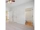 A bedroom features plush carpeting, white walls, and access to an en-suite bathroom, creating a comfortable and private space at 2956 Nestle Creek Dr, Marietta, GA 30062