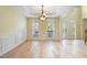 Light-filled dining room with wood floors, chandelier, and views of the front door at 2956 Nestle Creek Dr, Marietta, GA 30062