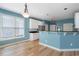 Eat-in kitchen with bright blue walls, stainless steel appliances, and lots of natural light at 2956 Nestle Creek Dr, Marietta, GA 30062