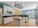 Modern kitchen equipped with stainless steel appliances, granite countertops, and hardwood floors at 2956 Nestle Creek Dr, Marietta, GA 30062