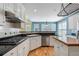 Gourmet kitchen featuring stainless steel appliances, gas range, and ample counter space at 2956 Nestle Creek Dr, Marietta, GA 30062