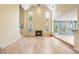 Spacious living room with hardwood floors, a fireplace, and large windows at 2956 Nestle Creek Dr, Marietta, GA 30062