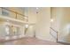 Bright, open living space with hardwood floors, high ceilings, and access to the dining and staircase at 2956 Nestle Creek Dr, Marietta, GA 30062