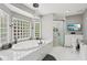 Beautiful bathroom featuring a soaking tub with a luxury shower and modern fixtures at 2631 Young Rd, Stone Mountain, GA 30088