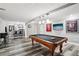 Spacious game room featuring a pool table and bar seating area at 2631 Young Rd, Stone Mountain, GA 30088