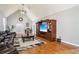 Spacious living room with vaulted ceilings, hardwood floors, and custom entertainment center at 2631 Young Rd, Stone Mountain, GA 30088