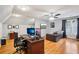 Spacious office with hardwood floors, neutral paint, and cozy seating at 2631 Young Rd, Stone Mountain, GA 30088