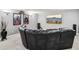 Movie theater room with large sofa and wall mounted lighting at 2631 Young Rd, Stone Mountain, GA 30088