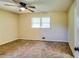 Bedroom featuring a ceiling fan and neutral-colored walls at 516 Jordan Nw Dr, Tucker, GA 30084
