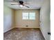 This bedroom has carpet flooring, a ceiling fan, and a closet at 516 Jordan Nw Dr, Tucker, GA 30084