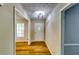Bright hallway boasts new floors and fresh paint throughout the home at 516 Jordan Nw Dr, Tucker, GA 30084