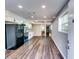 View of a new kitchen featuring updated appliances and white cabinets at 516 Jordan Nw Dr, Tucker, GA 30084