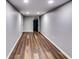 Room featuring wood floors, recessed lighting, and doorway at 516 Jordan Nw Dr, Tucker, GA 30084